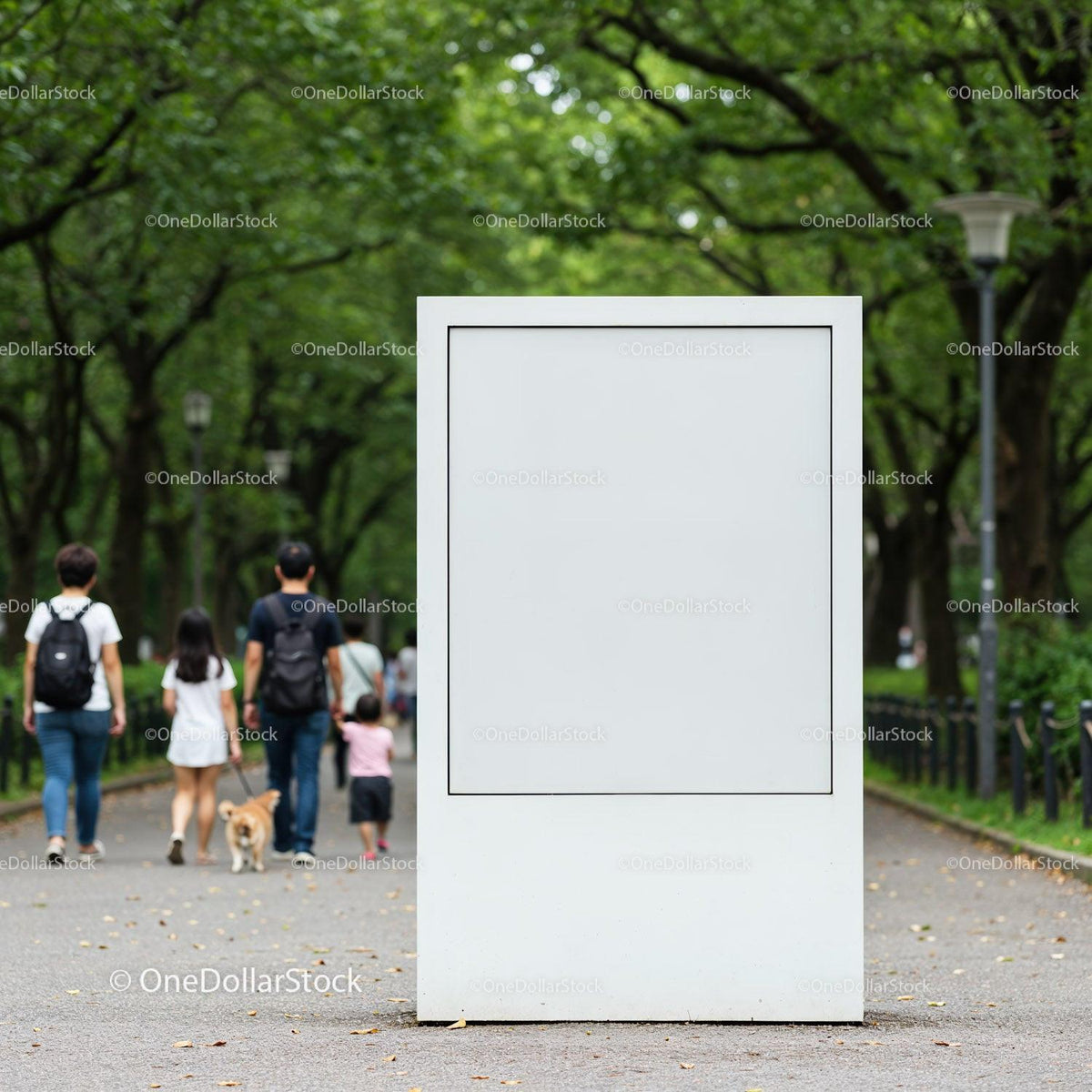 Blank white billboard in green park with walking family JPG Mockup Image preview