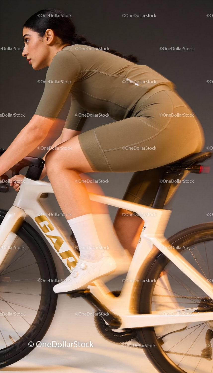 Focused cyclist training intensely on a modern road bike