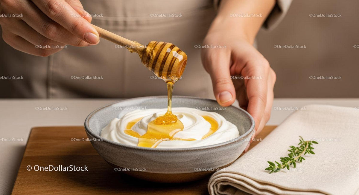Close-Up of Honey Dripping from Wooden Dipstick into a Bowl