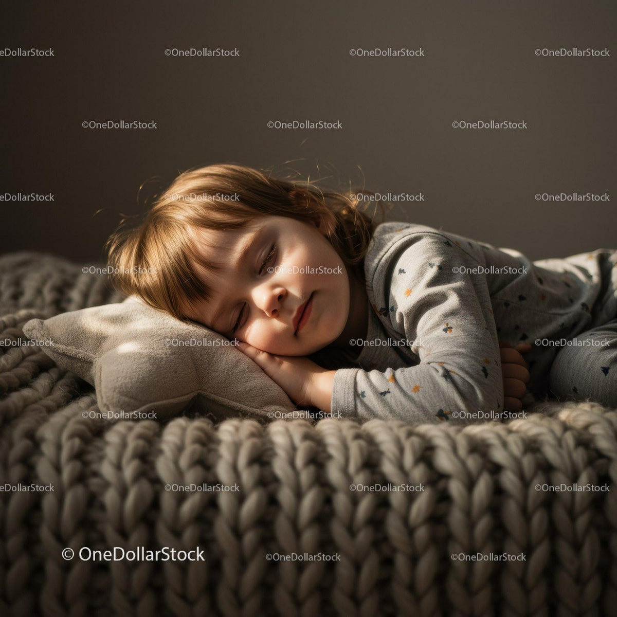 Peaceful toddler sleeping on cozy knitted blanket