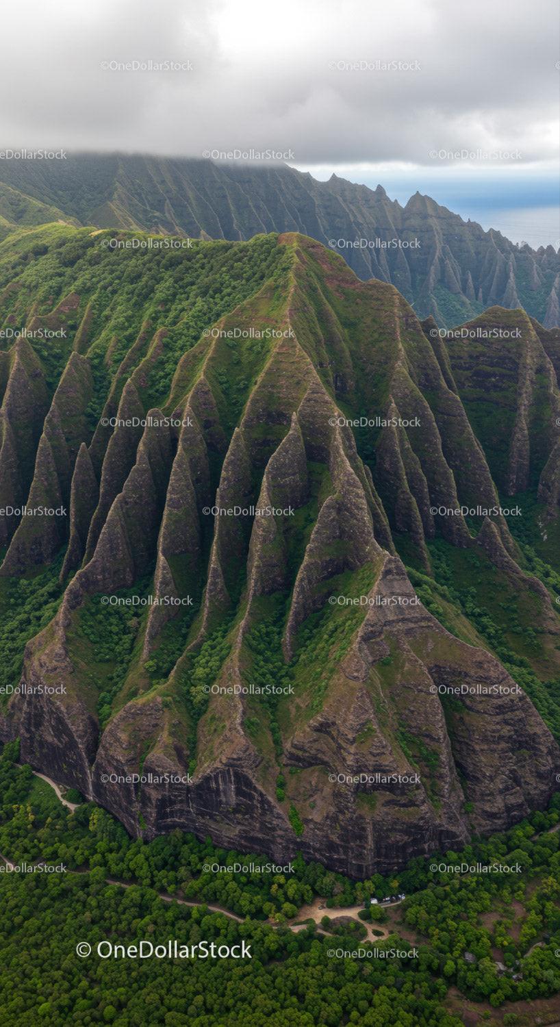 Green Mountain Ridge with Lush Forest and Dramatic Cliffs