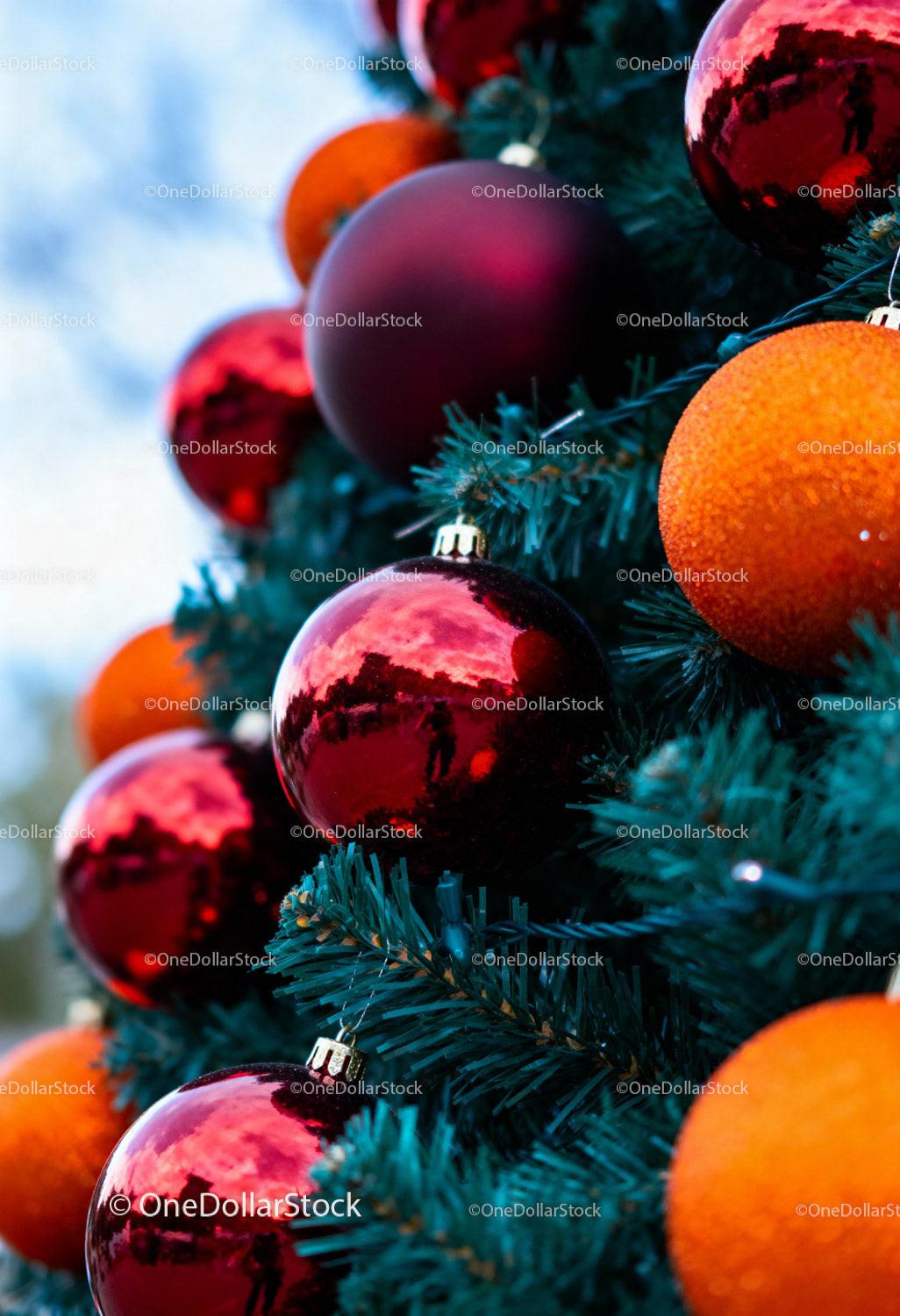 Close-up of Festive Christmas Tree with Red and Orange Ornaments