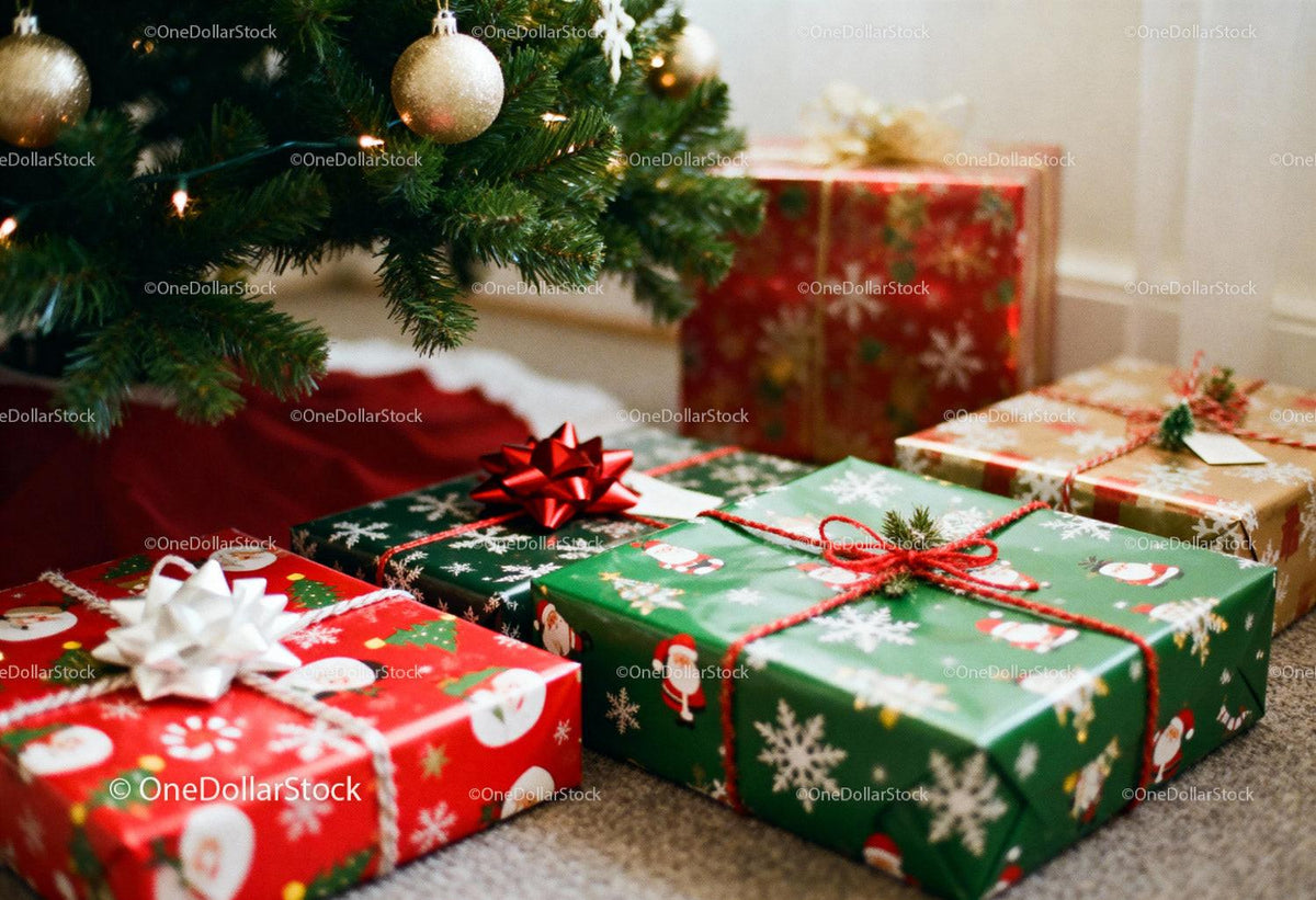 Festive Wrapped Christmas Gifts Under Tree With Ornaments