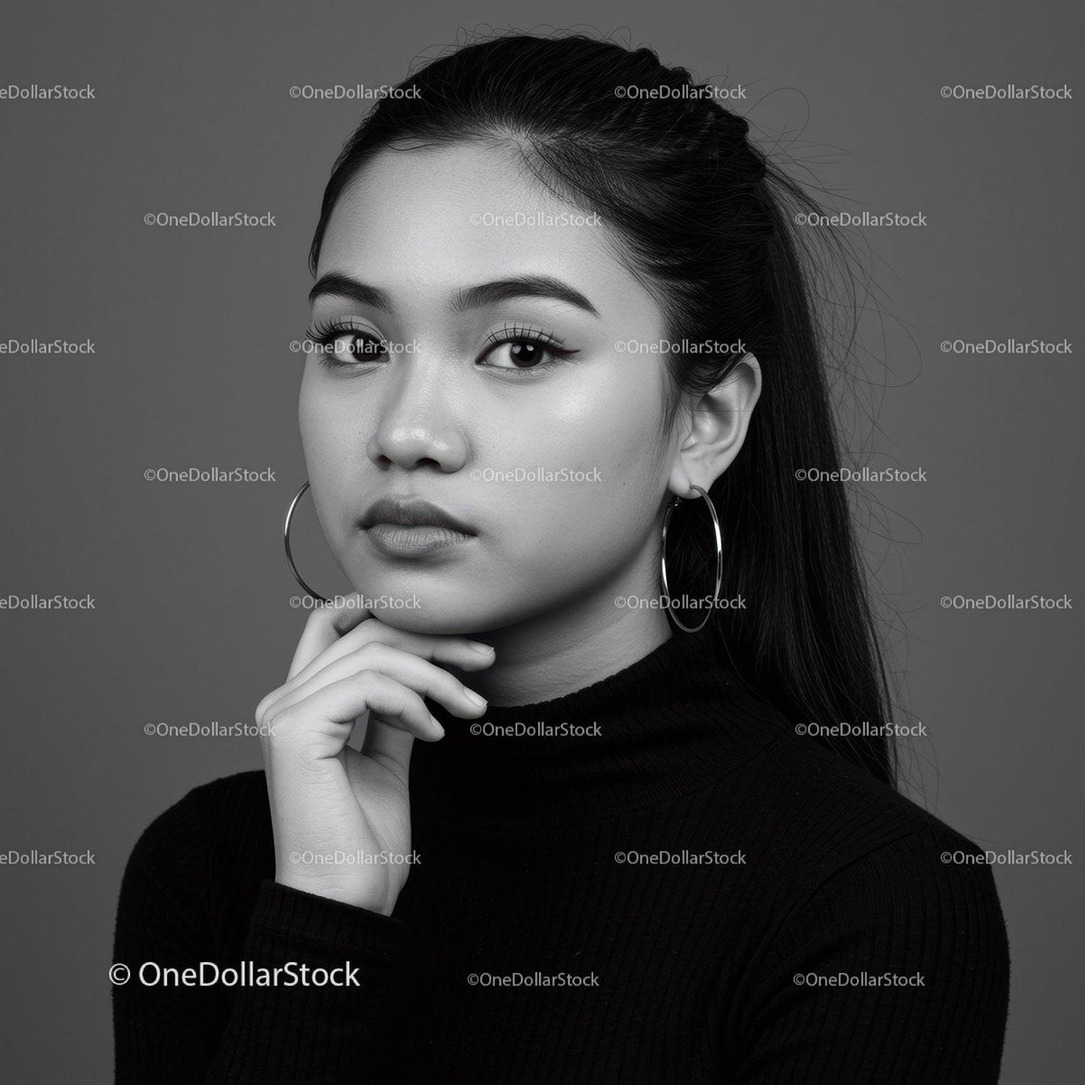 Stylish Young Woman Portrait in Monochrome with Hoop Earrings