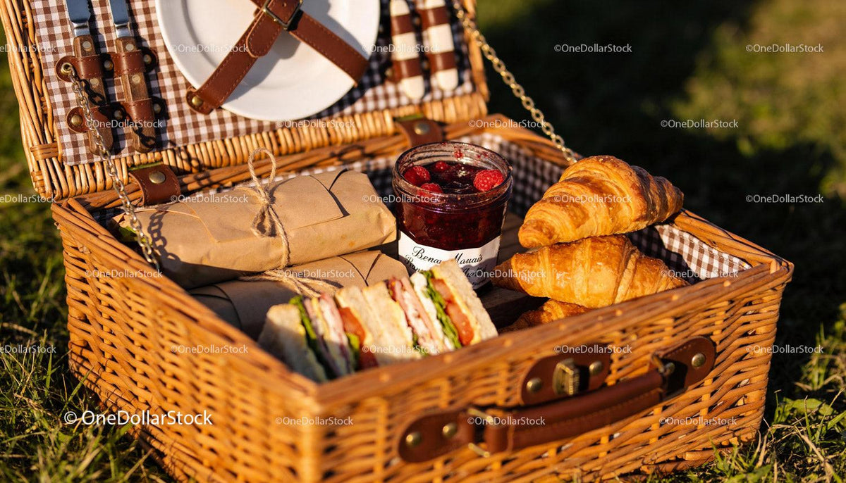 Fresh Picnic Basket with Sandwiches, Croissants, and Jam