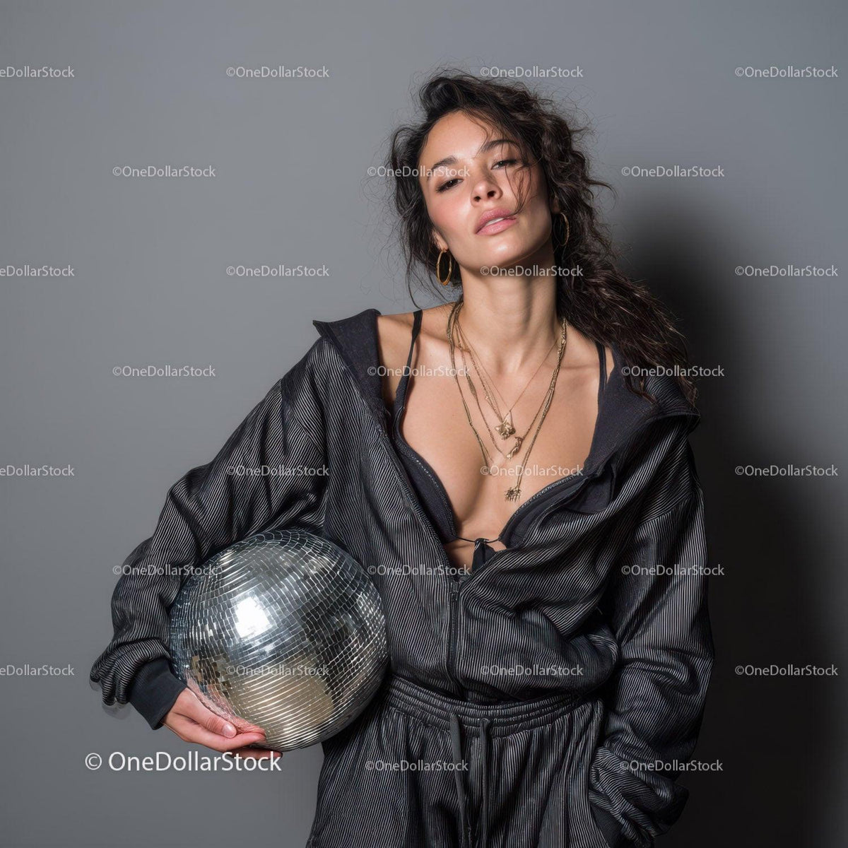 Stylish Woman in Metallic Outfit Holding Disco Ball for Modern Fashion Stock Photo Bundle preview 11