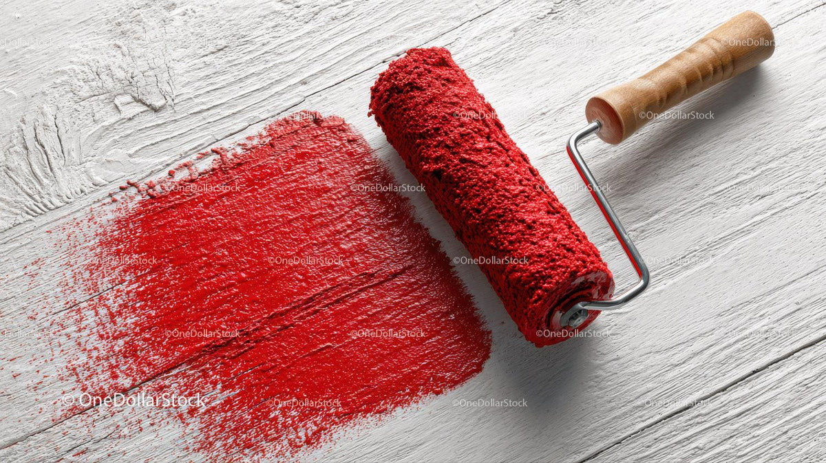 Red Paint Roller Smearing Bright Wall in Modern Interior Setting