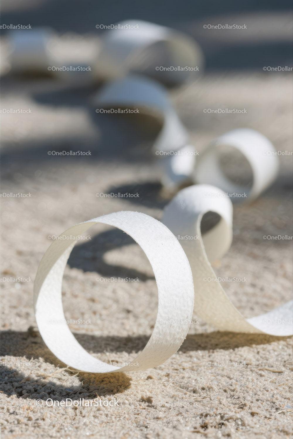 Close-up of White Plastic Ribbon Waste on Sandy Beach Stock Photo Bundle preview 13