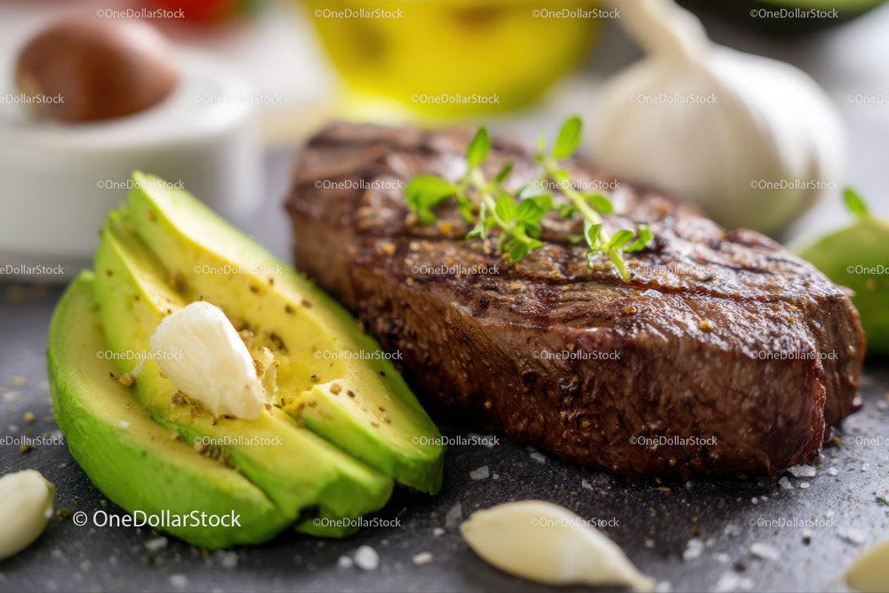 Juicy Grilled Steak with Fresh Avocado and Garlic on Rustic Board Stock Photo Bundle preview 31