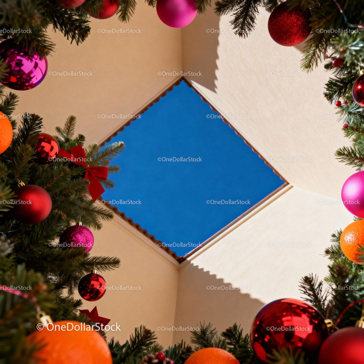 Festive Christmas decorations framing blue sky square roof