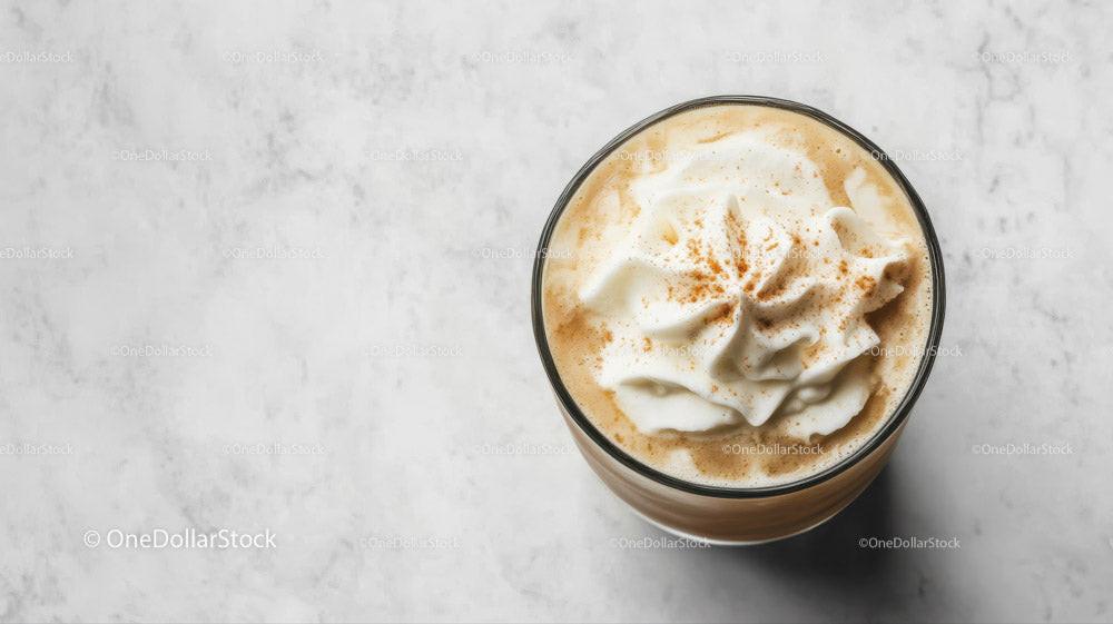 Frosted Iced Coffee with Whipped Cream and Cinnamon