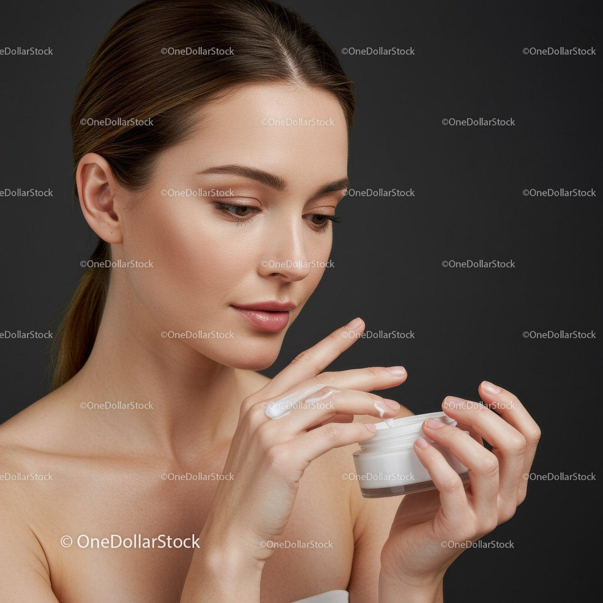 Young Woman Applying Facial Cream for Healthy Skin