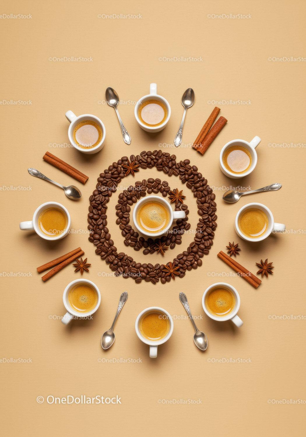 Circle of espresso cups with coffee beans and spices
