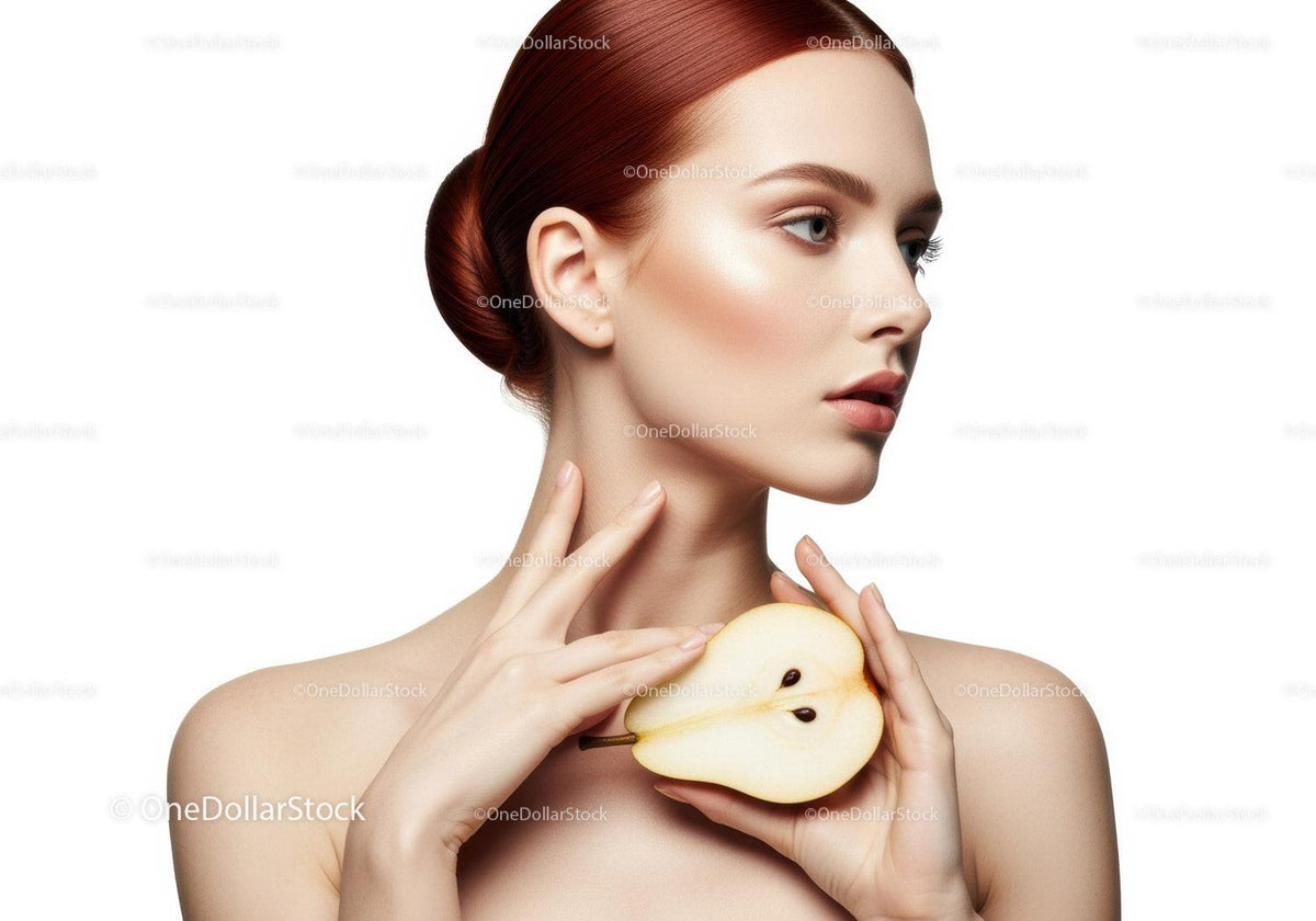 Elegant Woman with Red Hair Holding Sliced Pear Portrait Stock Photo
