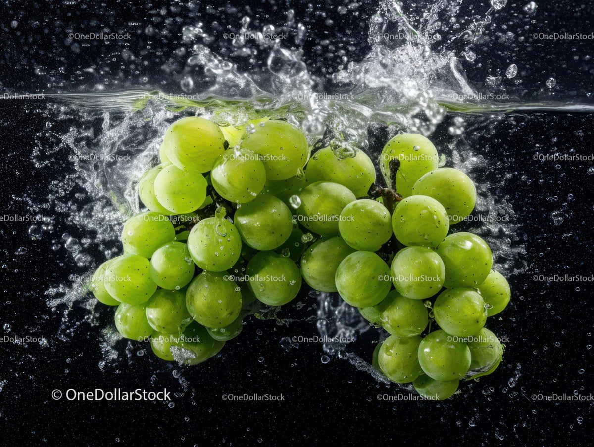 Fresh Green Grapes Splashing into Water with Bubbles