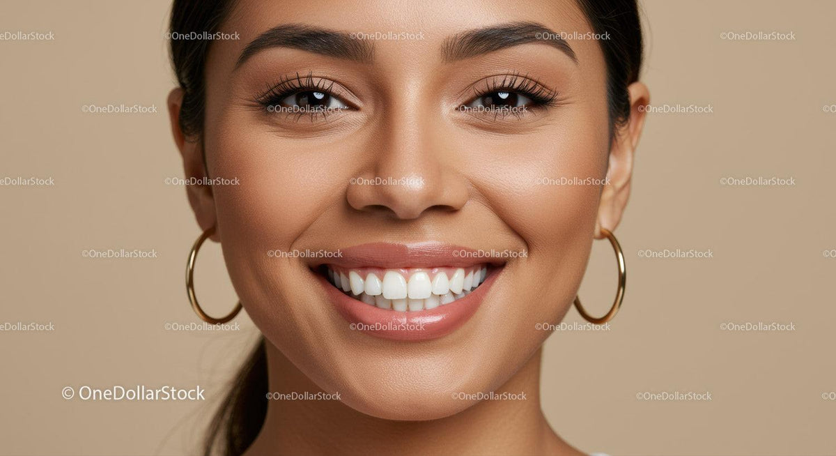 Close Up of Smiling Woman with Natural Makeup and Hoop Earrings