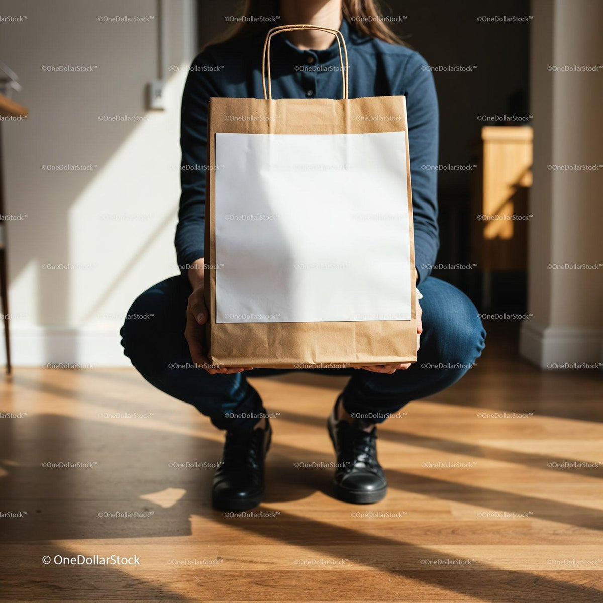 Person Holding Brown Paper Bag with Blank Label Indoors JPG Mockup Image preview