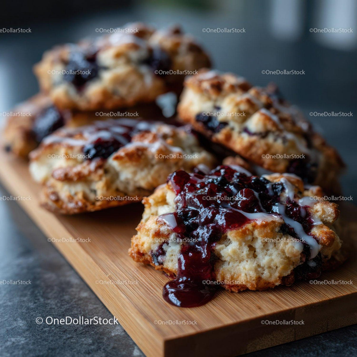 Blueberry Scones With Berry Topping on Wooden Serving Board