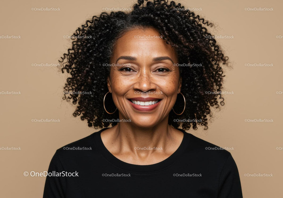 Confident Woman with Curly Hair and Hoop Earrings in Professional Portrait