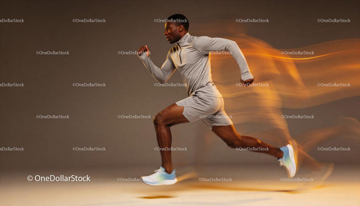 Athlete sprinting fast against motion blur background