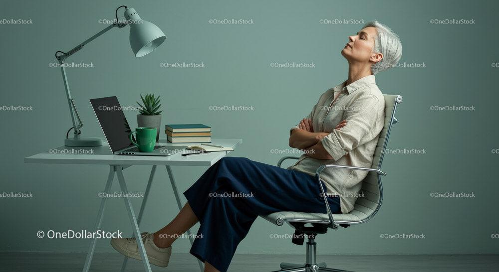 Thoughtful Woman Enjoying Peaceful Moment in Modern Office Stock Photo Bundle preview 6