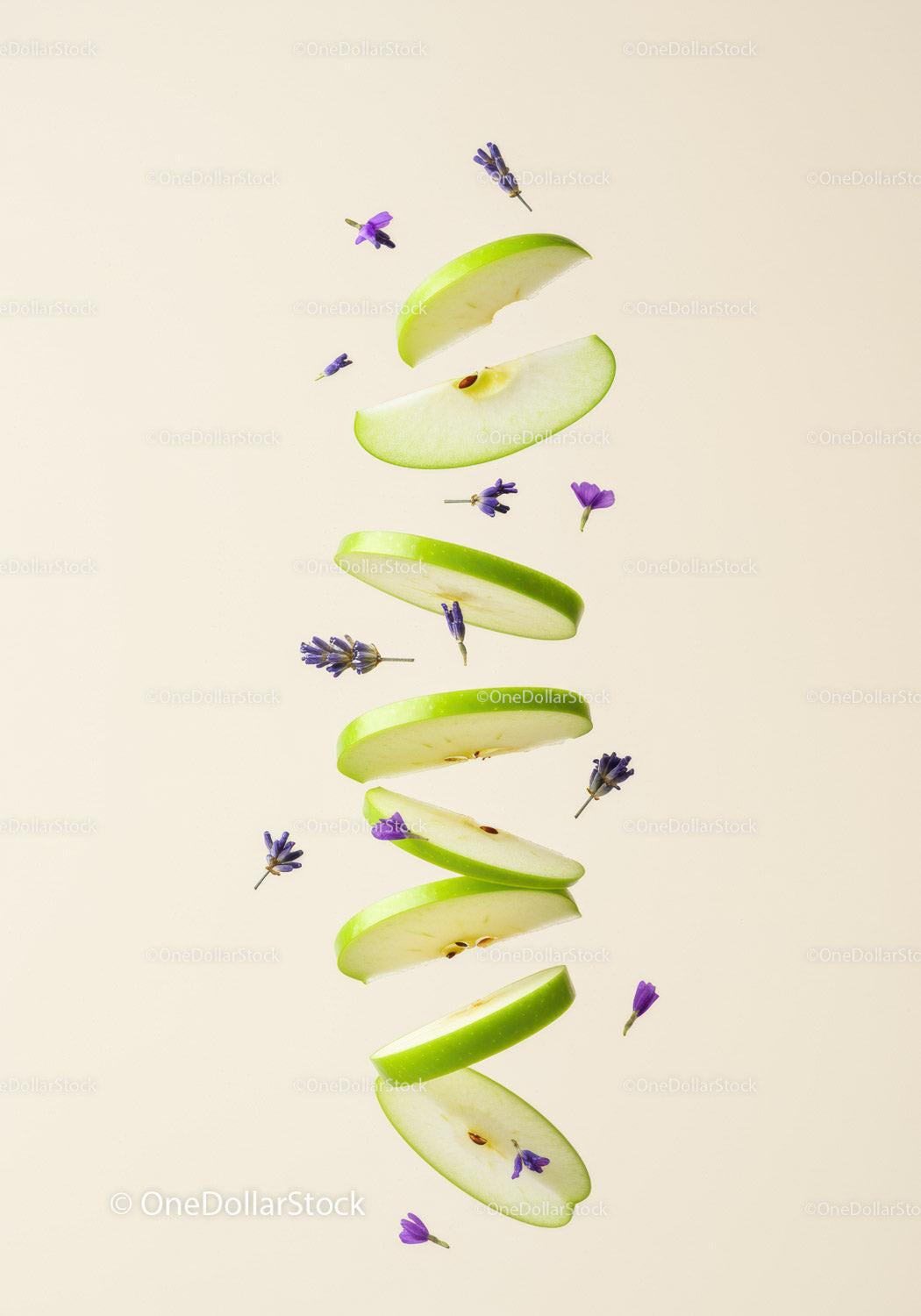 Floating Green Apple Slices with Delicate Purple Flowers