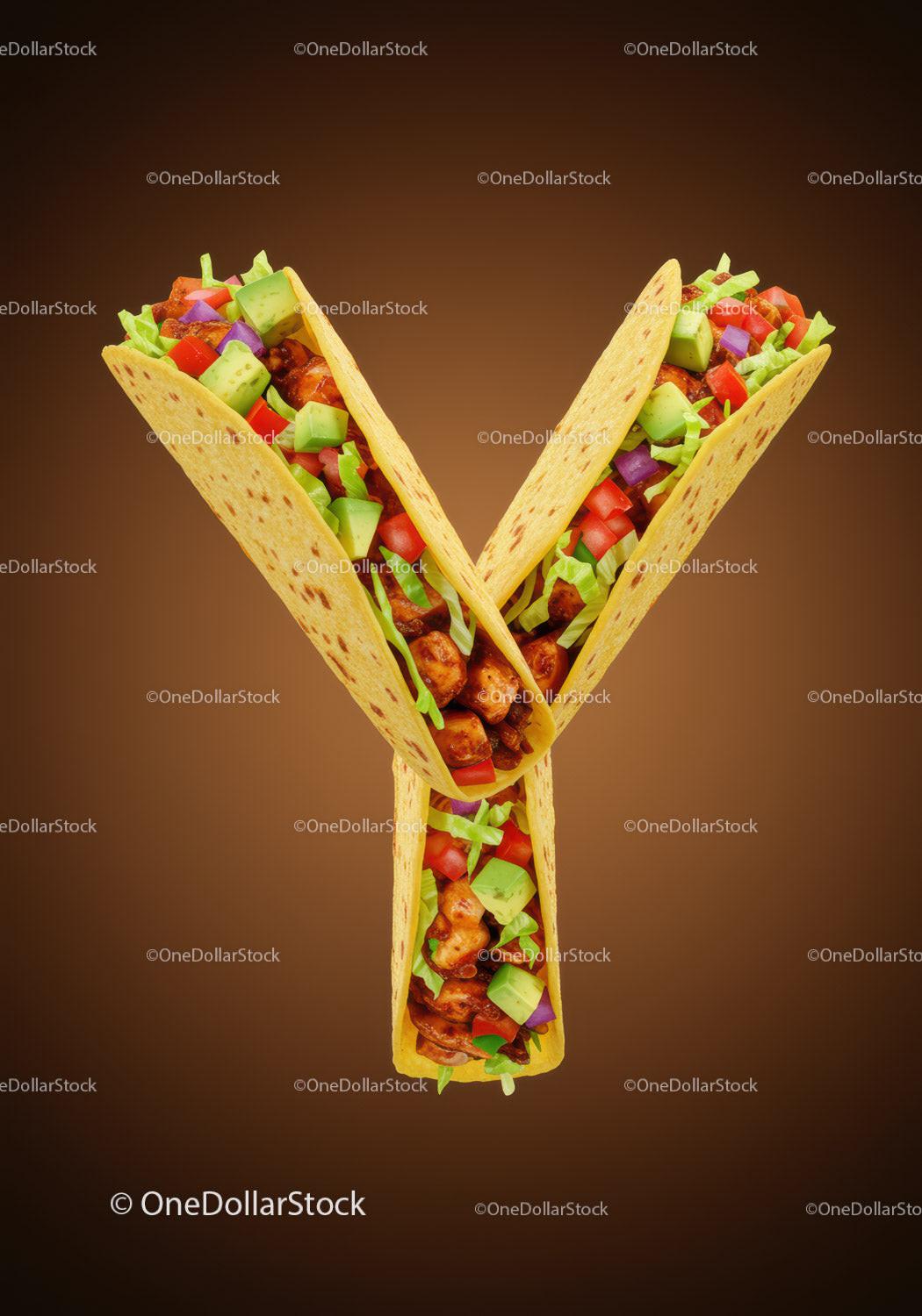 Taco arrangement in Y letter shape on brown background