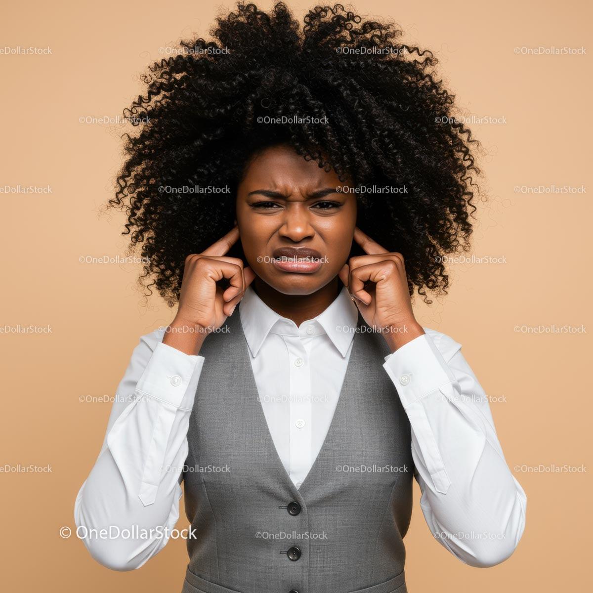 Confused Woman Covering Ears with Frustrated Expression in Business Attire