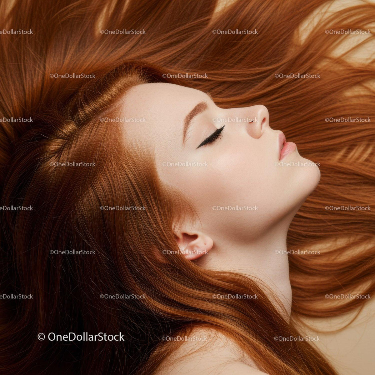 Profile view of serene woman with flowing red hair