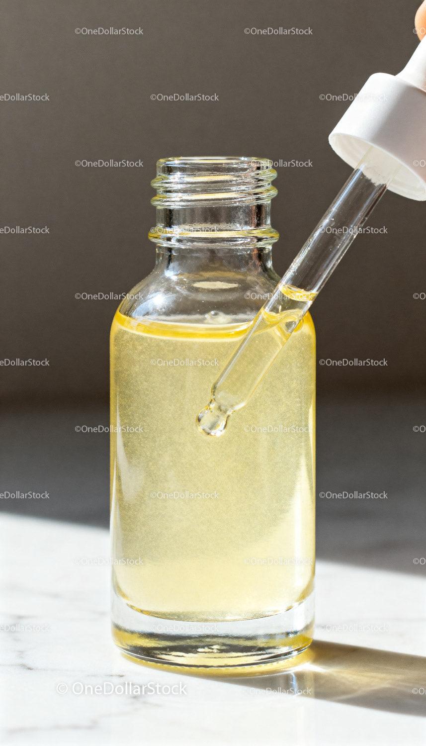 Glass Dropper Bottle with Golden Facial Oil Serum