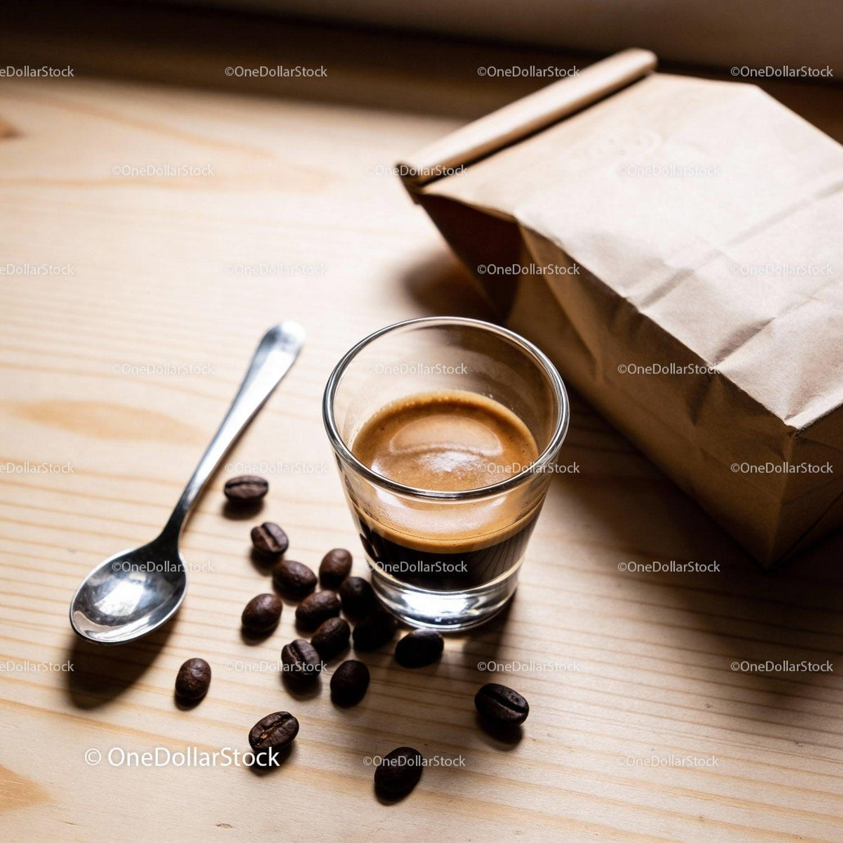 Fresh espresso shot with coffee beans and kraft bag