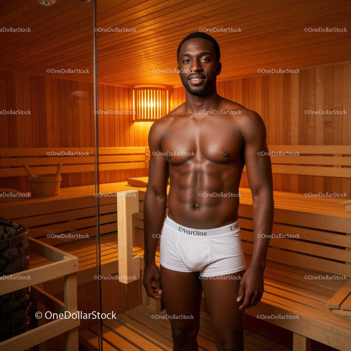 Male Model in a Wooden Sauna with Toned Physique and Relaxing Atmosphere