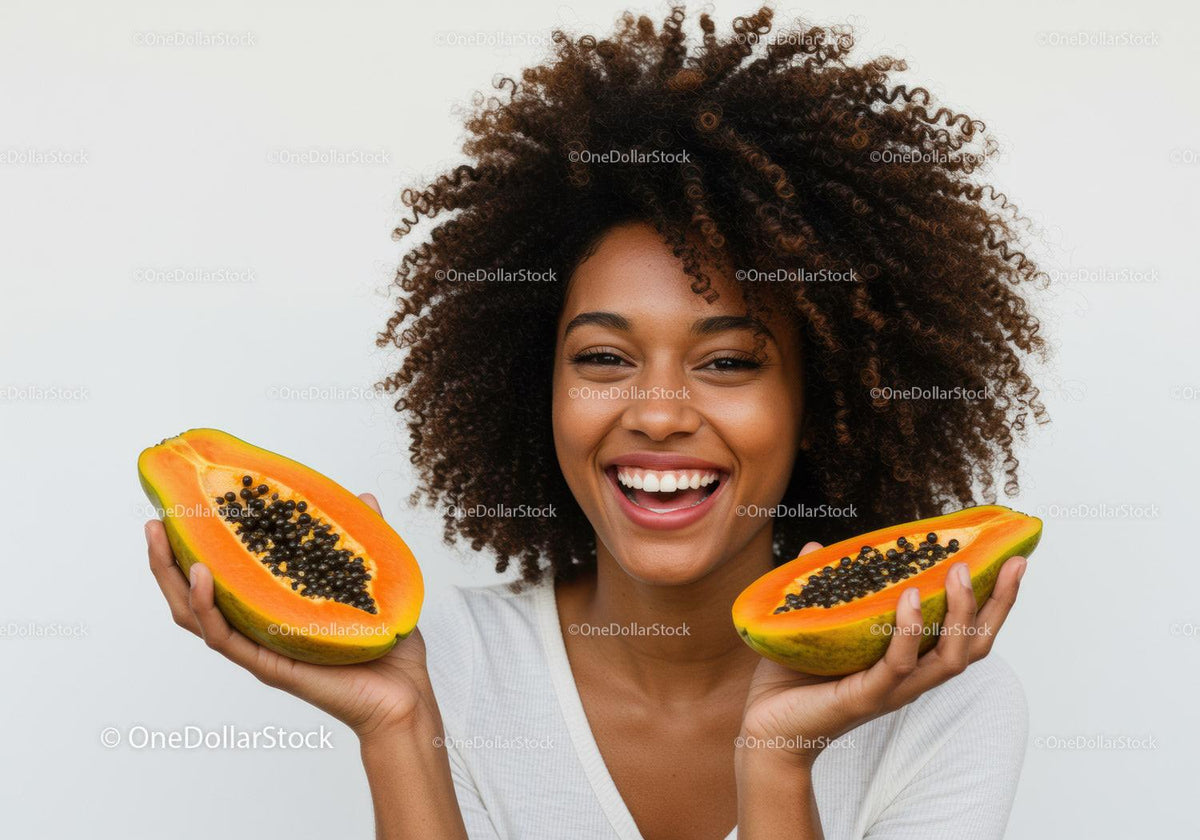 Smiling Woman Holding Fresh Ripe Papayas in Both Hands