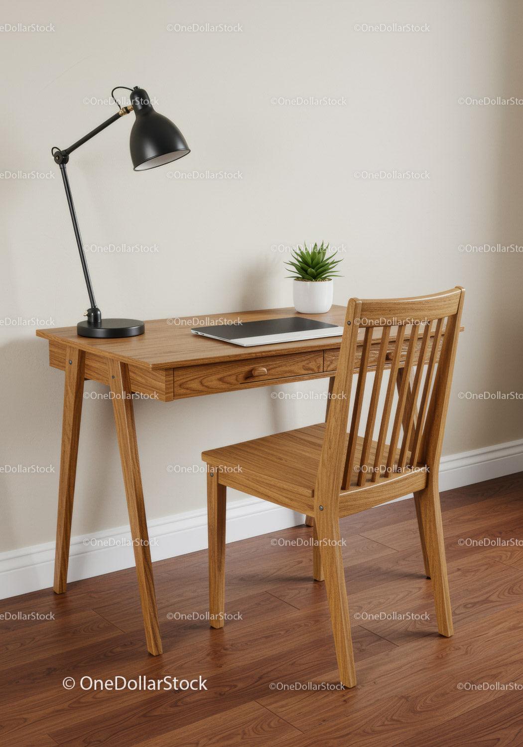 Wooden Desk and Chair with Desk Lamp and Potted Plant in Cozy Home Office