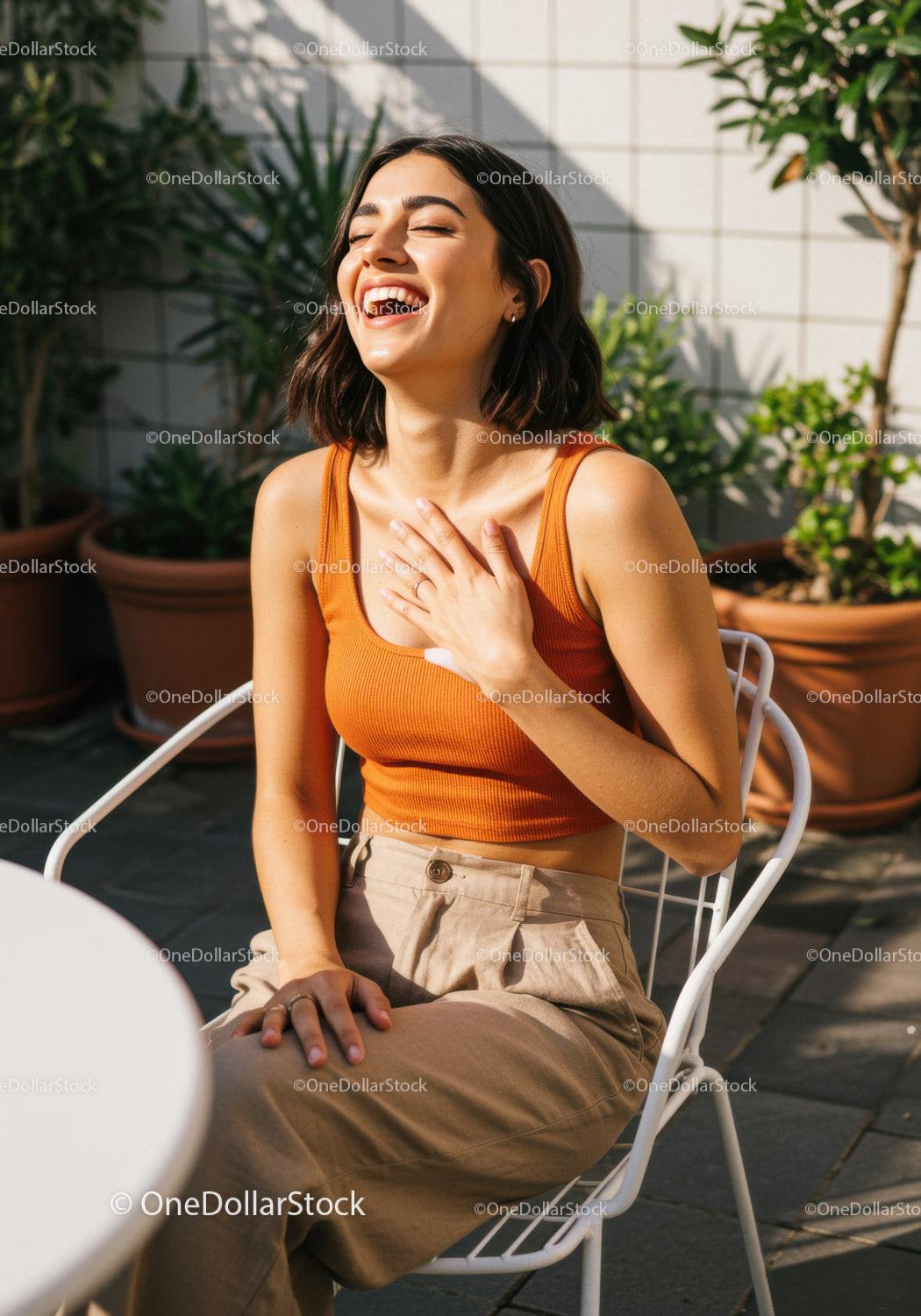 Young Woman Laughing Outdoors in Casual Summer Outfit