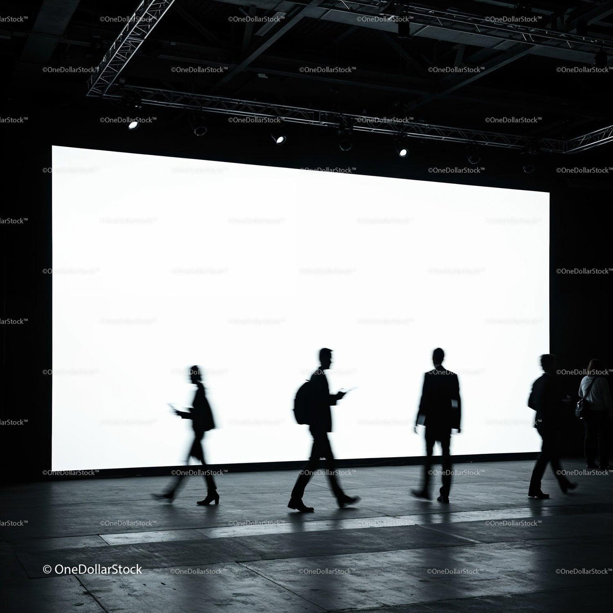 Silhouettes of people walking in front of bright screen JPG Mockup Image preview