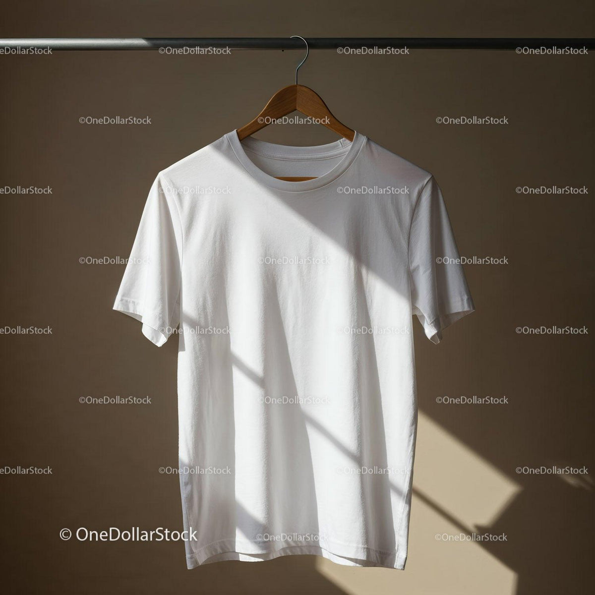 Plain white t-shirt hanging on wooden hanger indoors JPG Mockup Image preview