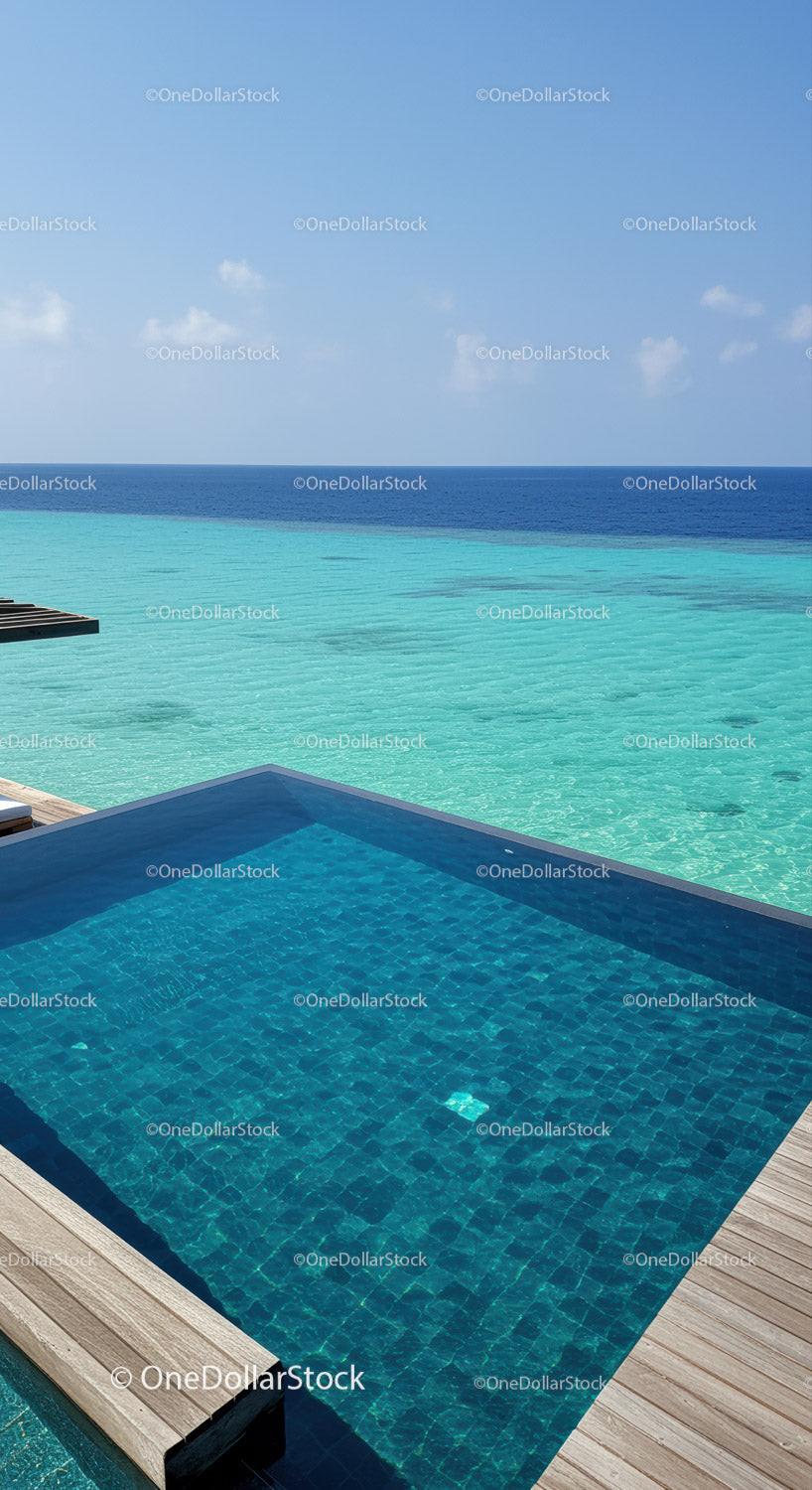 Luxury Infinity Pool with Ocean View and Wooden Deck