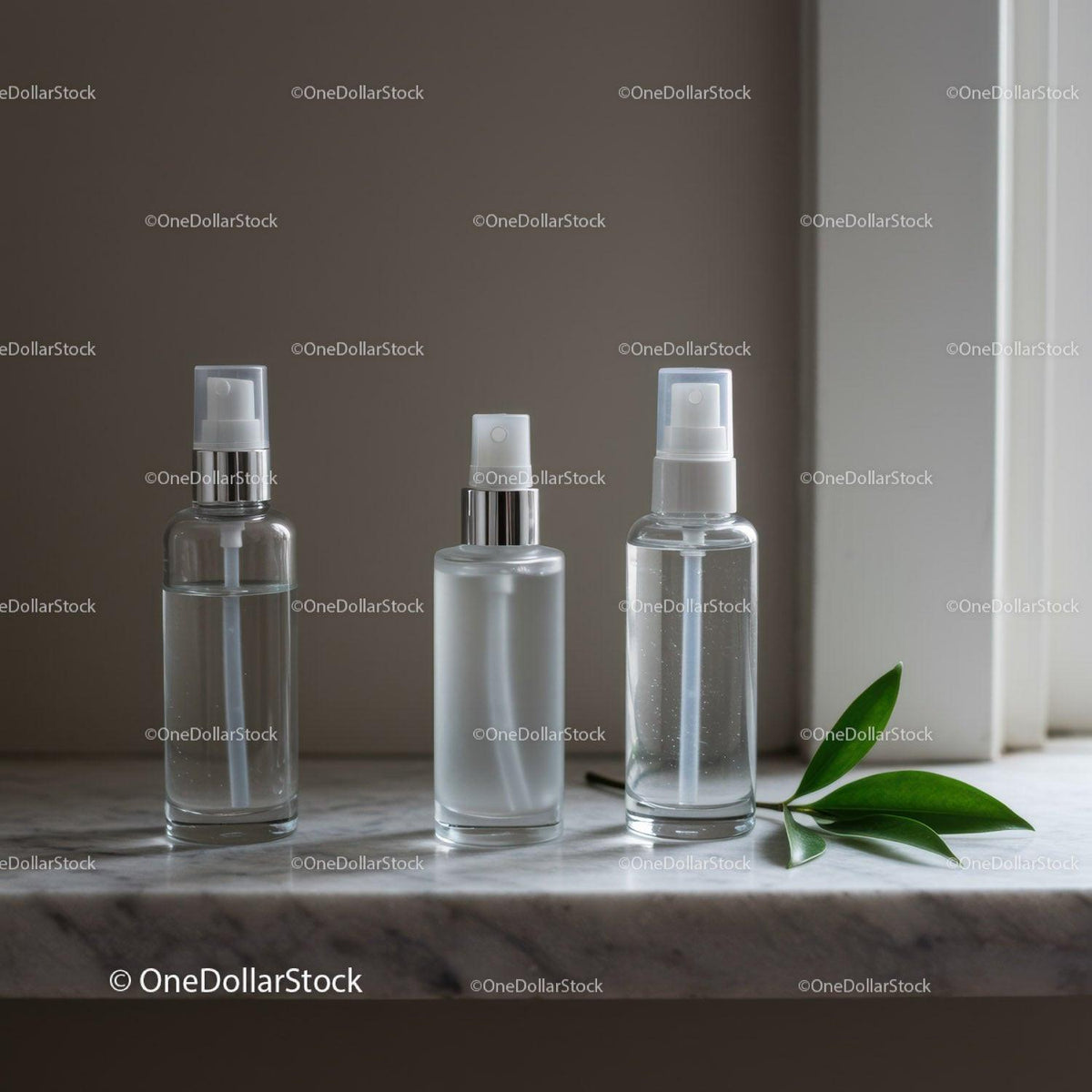 Minimalist skincare spray bottles on marble surface JPG Mockup Image preview