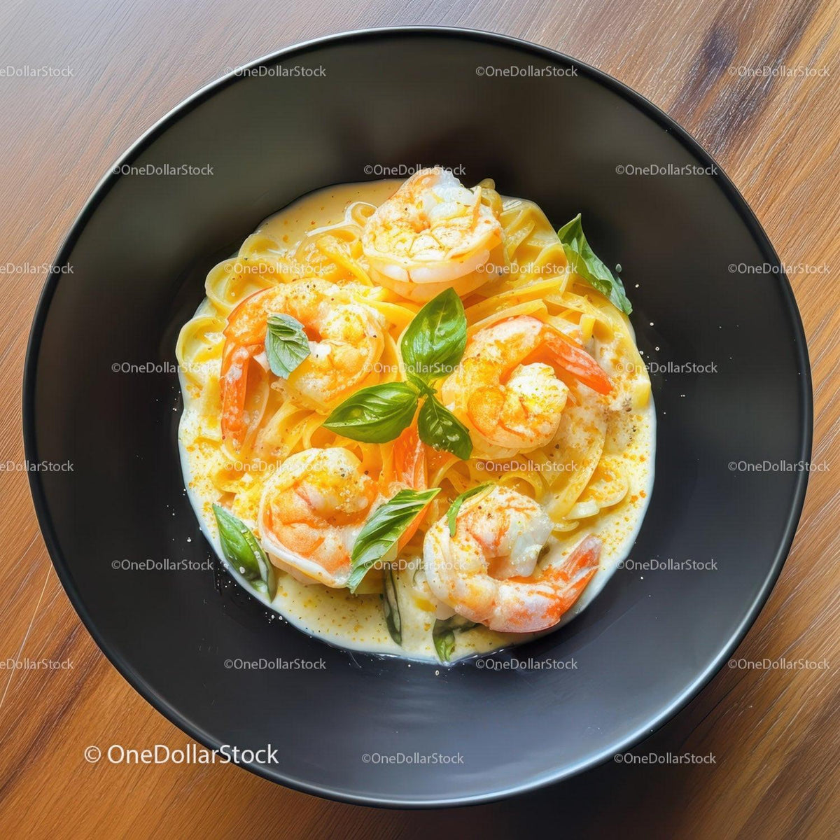 Shrimp Fettuccine in Creamy Sauce with Basil and Seafood Garnish