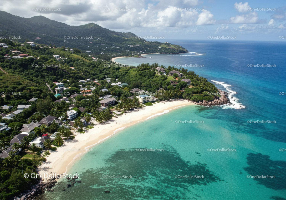 Scenic Tropical Beach with White Sand and Lush Greenery