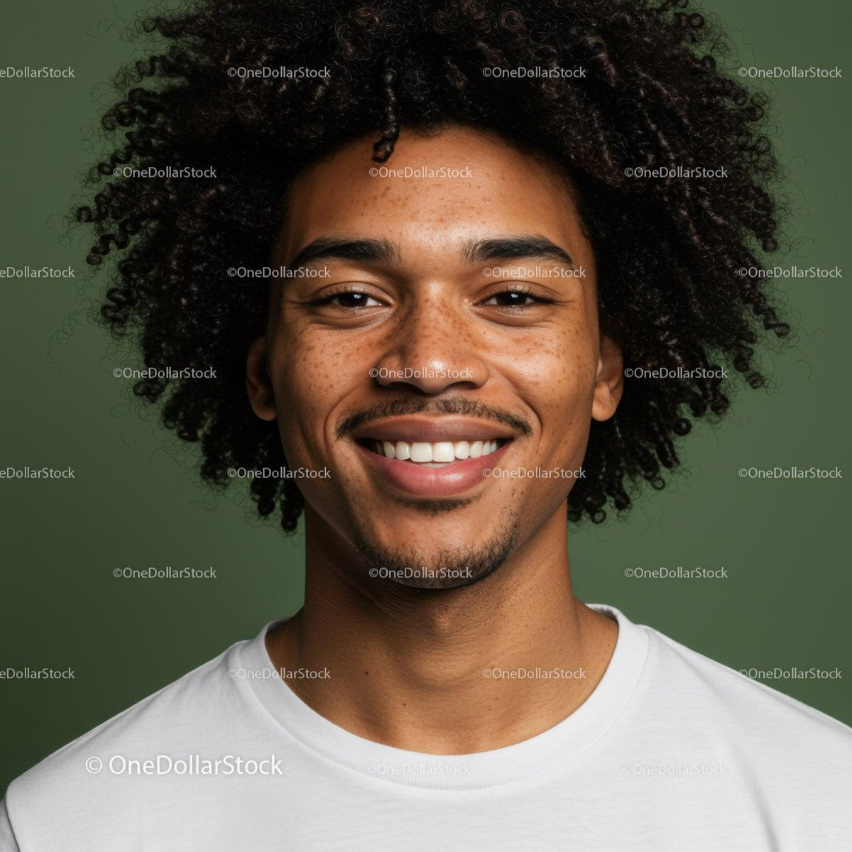 Portrait of a Smiling Man with Curly Hair in Bright Casual Style