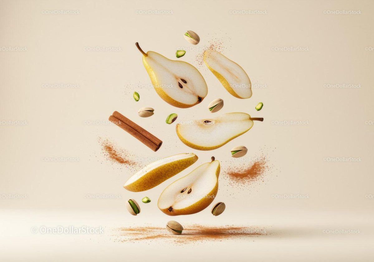 Sliced pear with cinnamon and pistachios floating