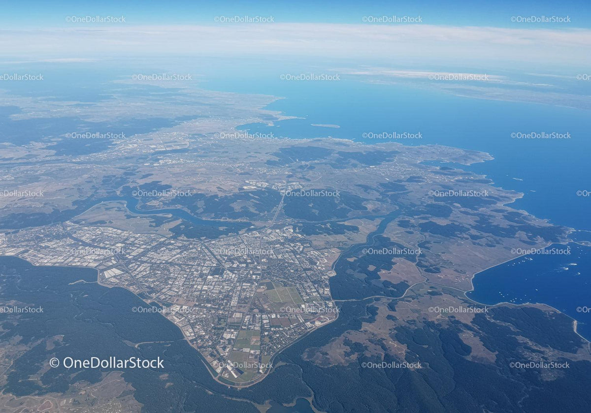 Aerial View of Coastal Urban Landscape with Lakes and Forests