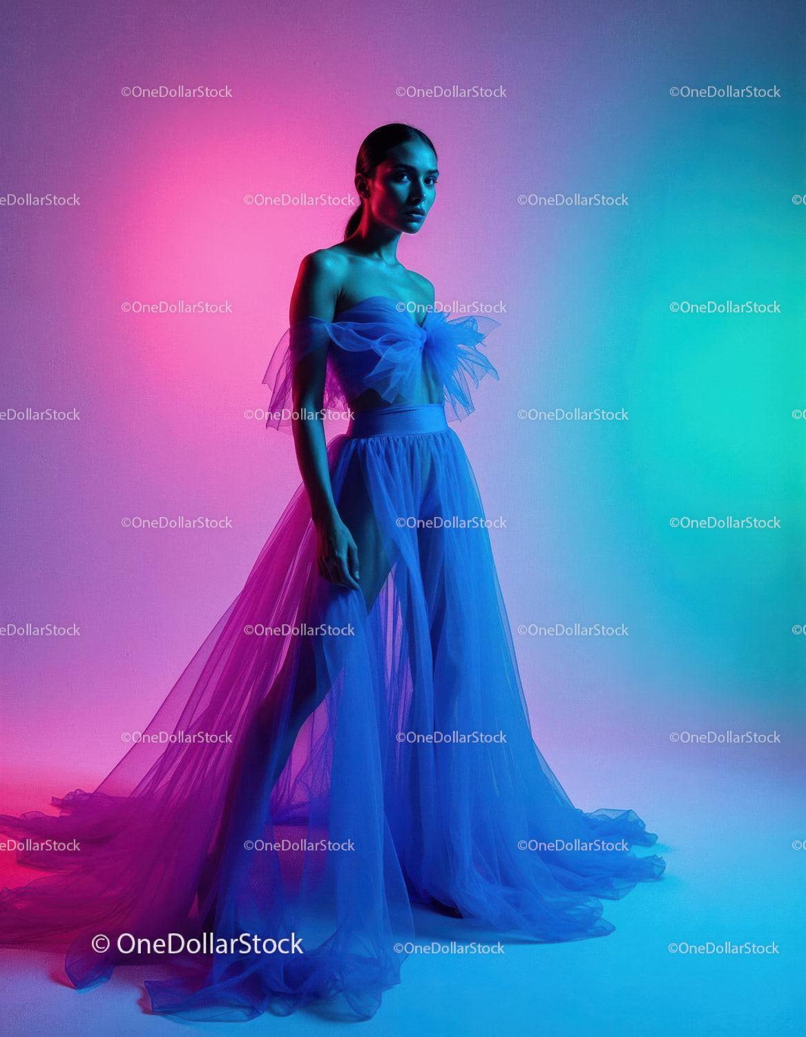 Elegant Blue Tulle Dress Surrounded by Colorful Artistic Lighting