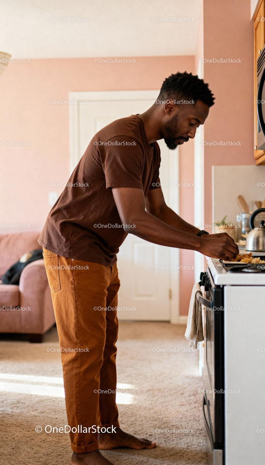 Man Preparing Food in Cozy Home Kitchen