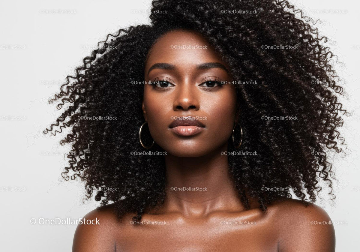 Elegant African American Woman with Curly Hair in Studio Portrait