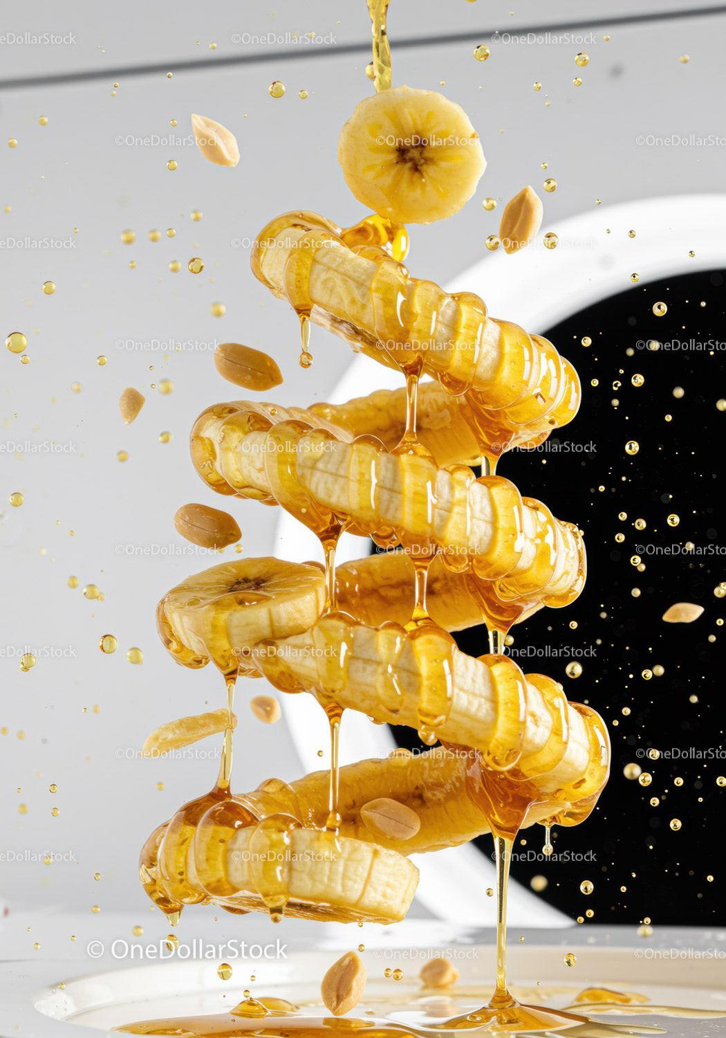 Banana slices dripping honey with scattered peanuts