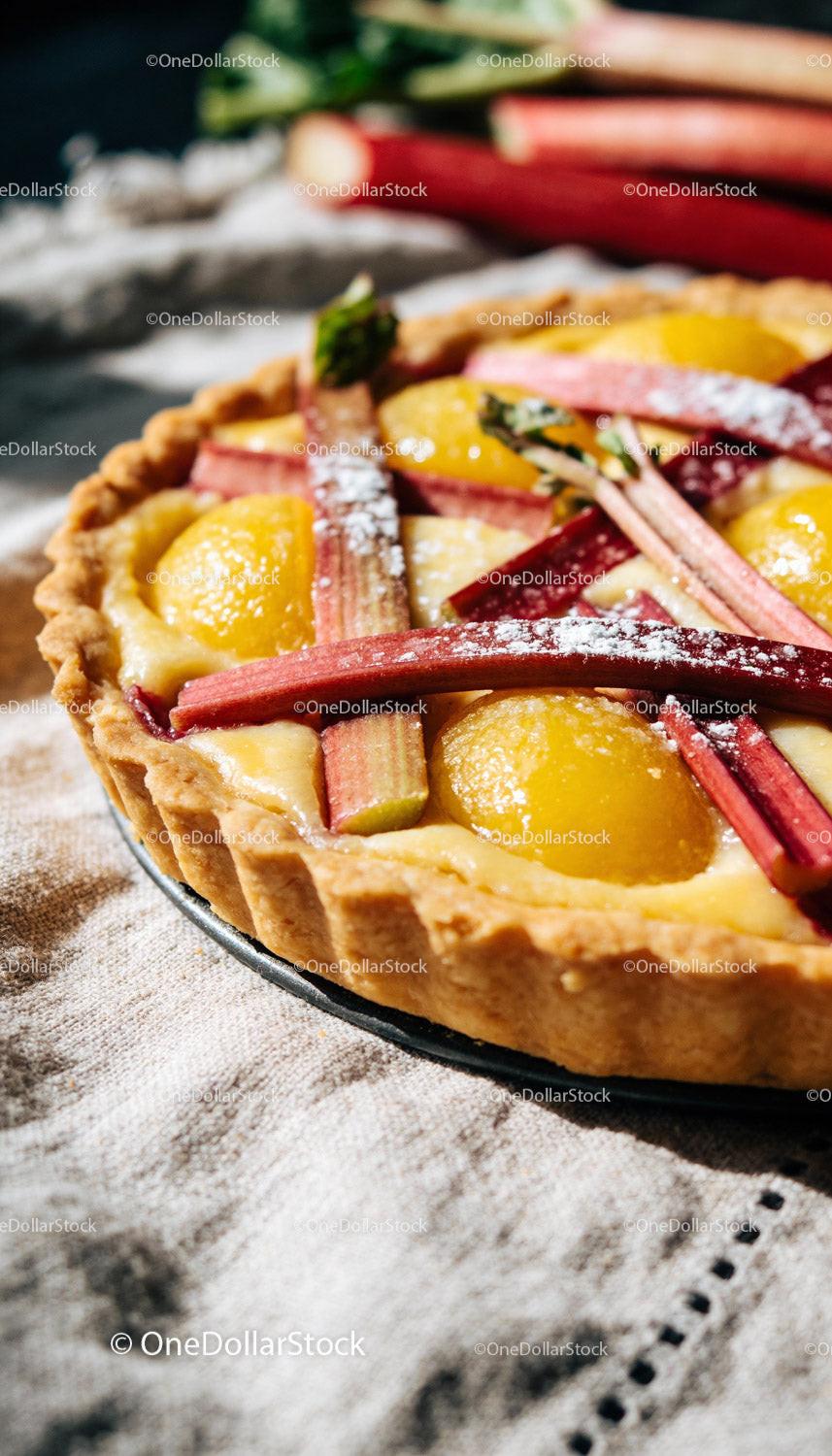 Fresh Apricot and Rhubarb Tart with Powdered Sugar