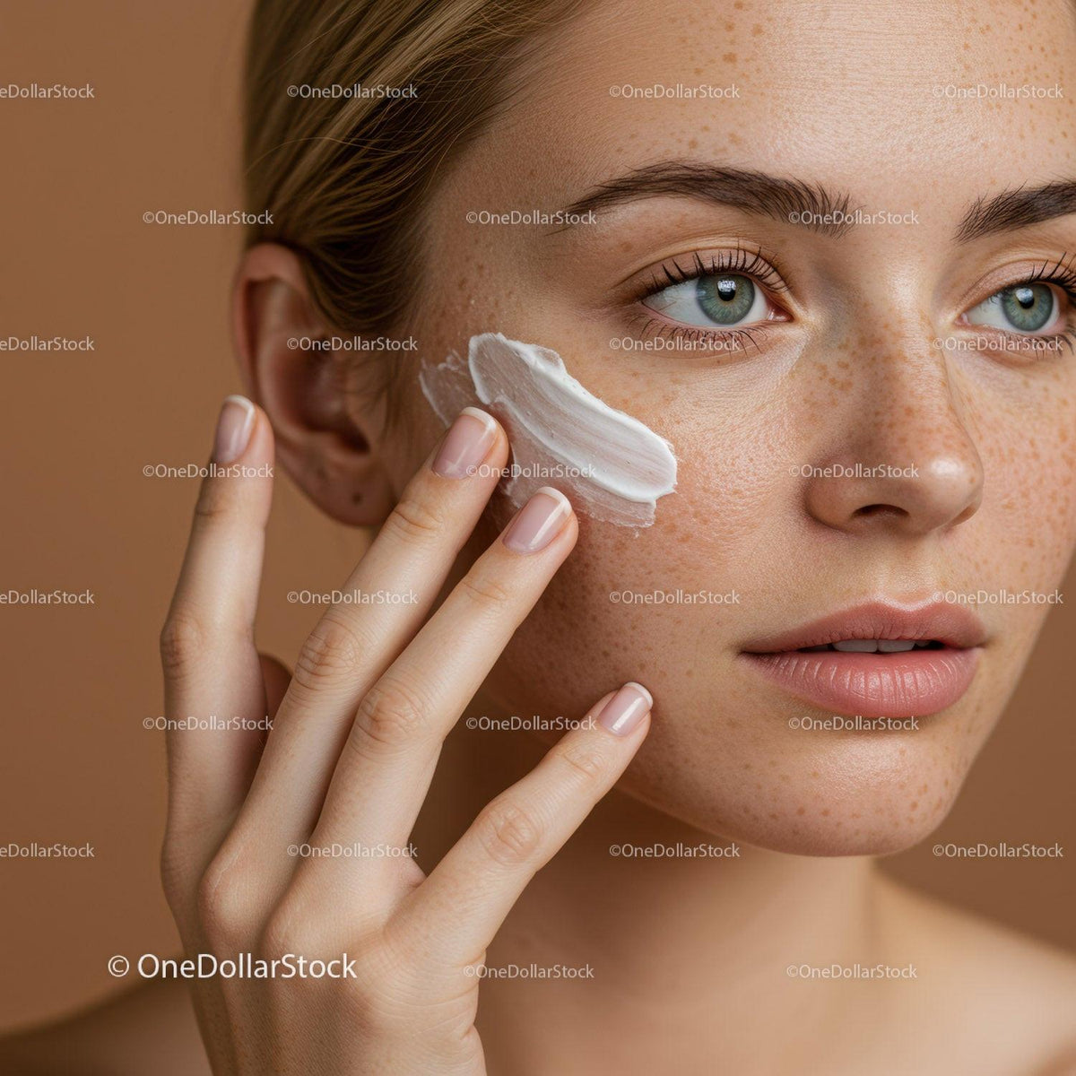 Close-Up of Woman Applying Face Cream For Flawless Skin